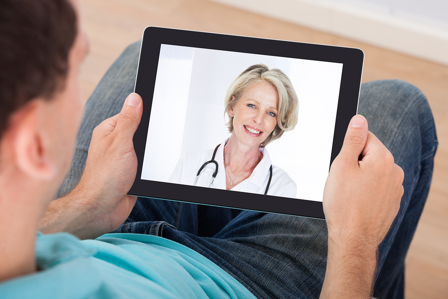 Man Having Video Chat With Female Doctor